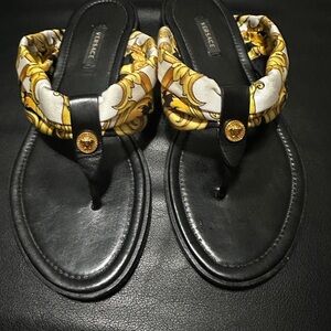 Versace Women's Black and Gold Hibiscus print Sandals